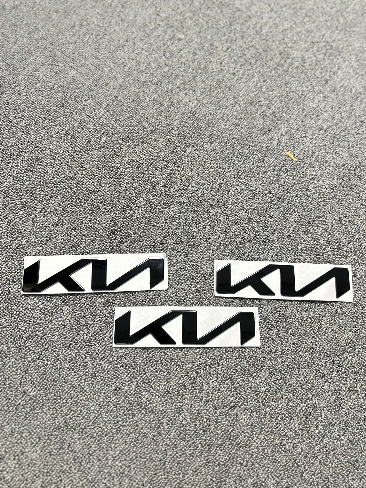 Glossy black Front logo emblems for kia seltos , sonet etc